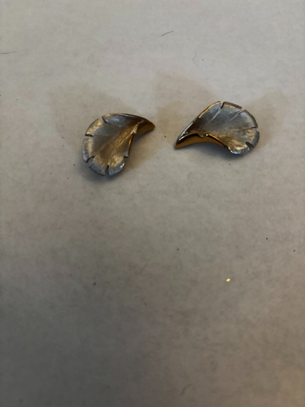 Clip on earrings gold tone brushed silver tone feather